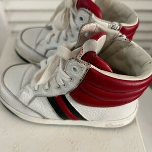 Gucci red and white sneakers iconic red and green stripe on side